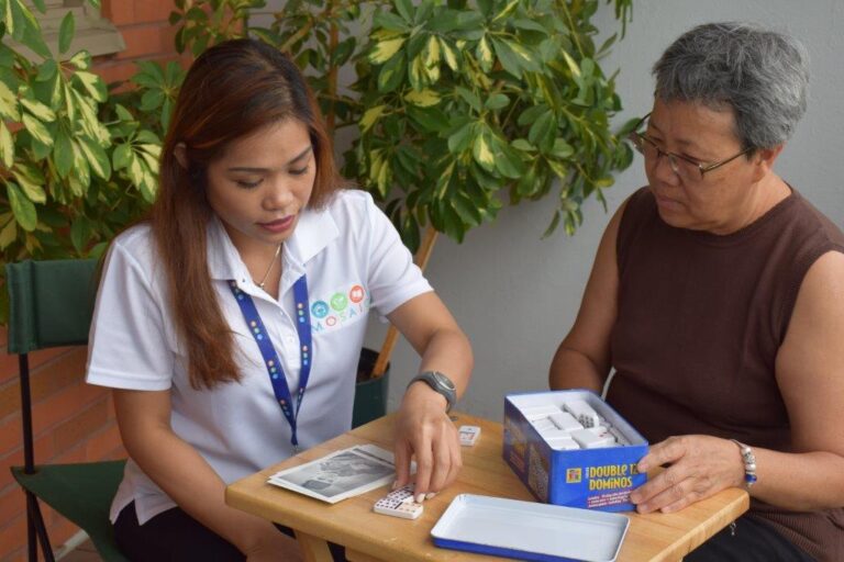 Mosaic home care nurse socializing with senior