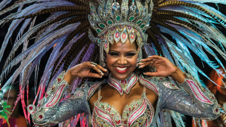 Female Performer in elaborate colourful costume