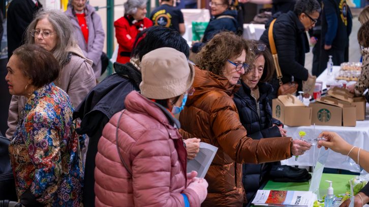 Event attendees interacting with vendors